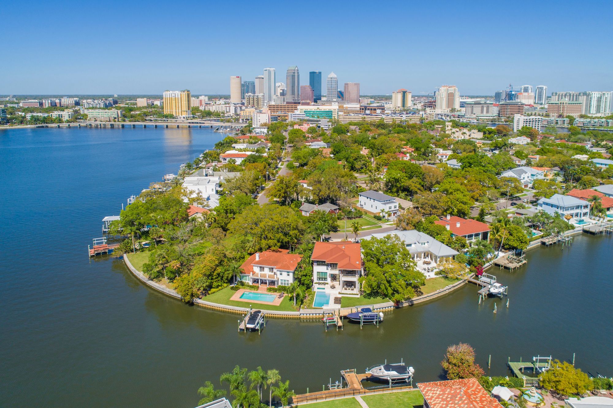 Aerial view of Tampa waterfront homes and the downtown skyline